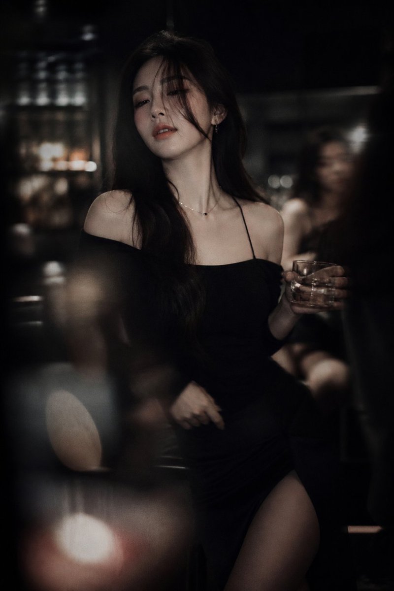 Low-light cinematic portrait telephoto lens GPT Image 2 prompt example
