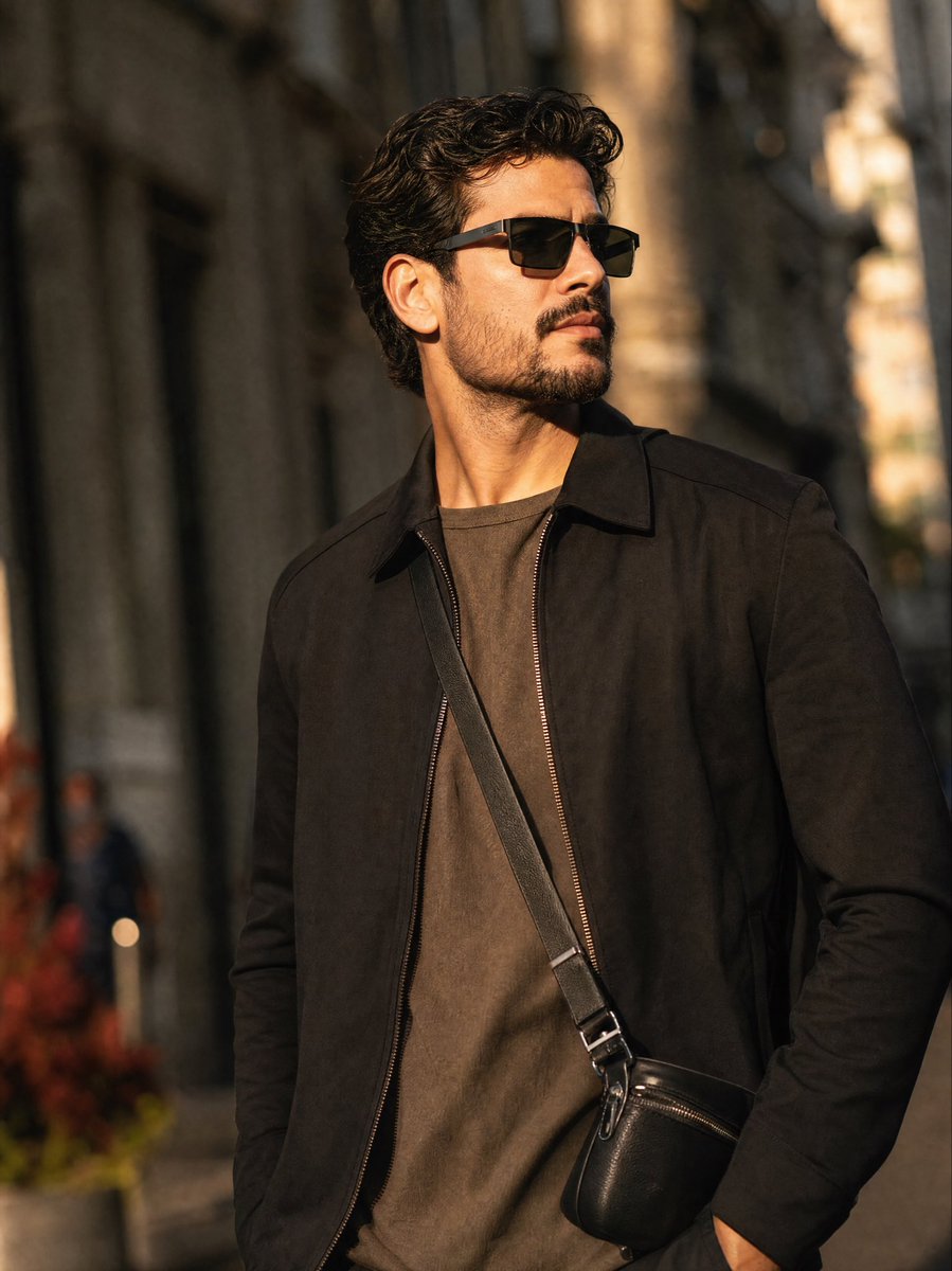 Cinematic street-style portrait confident young GPT Image 2 prompt example